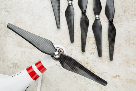 carbon fiber propellers with a quadcopter drone armの写真素材