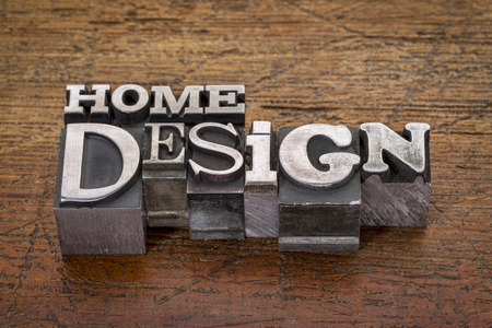 home design text  in mixed vintage metal type printing blocks over grunge woodの写真素材