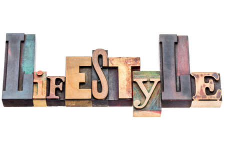 lifestyle word - isolated text in mixed letterpress wood type printing blocksの写真素材