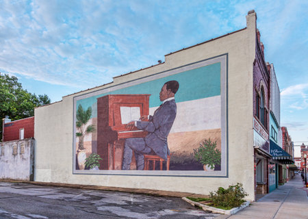 SEDALIA, MO, USA - AUGUST 3, 2015: Scott Joplin plays Maple Leaf Rag on piano - a large building wall mural by Stanley James Herd in historic downtown of Sedalia, Missouri.のeditorial素材
