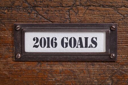 2016 goals  - a label on a grunge wooden file cabinet, New Year goals and resolutions conceptの写真素材