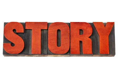 story word - isolated text in vintage letterpress wood type printing blocks stained by red inkの写真素材