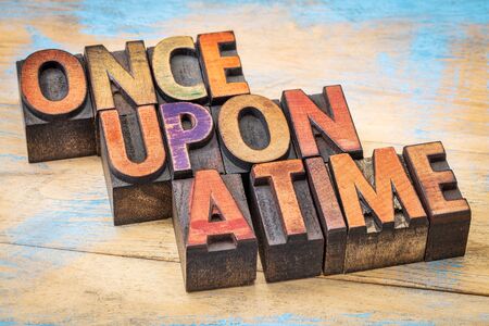once upon a time opening phrase - storytelling concept  - text in vintage letterpress wood type...