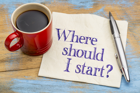 Where should I start? A question on a napkin with a cup of coffee.の写真素材