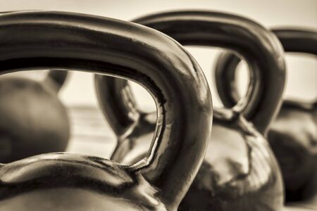 heavy iron kettlebells - black and white abstract with a shallow depth of field - fitness conceptの写真素材
