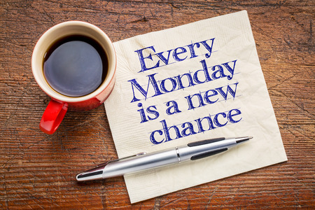 Every Monday is a new chance - motivational handwriting on napkin with a cup of coffeeの写真素材