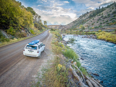 BURNS, CO, USA - SEPTEMBER 28, 2016: Toyota 4Runner SUV (2016 Trail edition) carrying  a paddleboard...