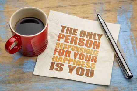 The only person responsible for your happiness is you - word abstract on a napkin with a cup of coffeeの写真素材