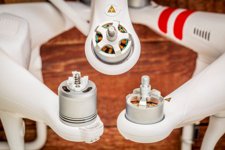 FORT COLLINS, CO, USA - DECEMBER 18, 2016:  Comparison of electric motors from fifferent models of DJI quadcopter drones: from left Phantom 4, 3, and 2.のeditorial素材