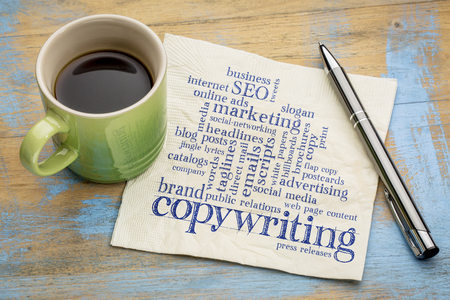 copywriting word cloud  - handwriting on a napkin with a cup of coffeeの写真素材