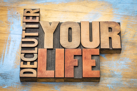 declutter your life  word abstract in vintage letterpress wood type printing blocksの写真素材