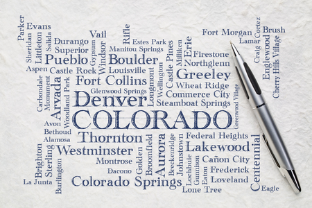 major cities of Colorado (with population more than 5000) word cloud - handwriting on a white lokta paperの写真素材