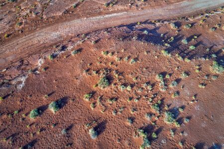 4wd road in a rock desert in the Moab area, Utah - aerial viewの写真素材