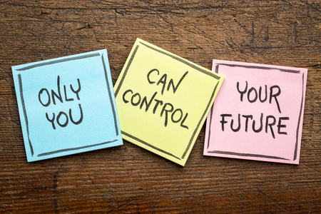 Only you can control your future - positive words on  sticky notes against rustic woodの写真素材