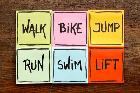 walk, bike, jump, run, swim, life - fitness or cross training concept - handwriting on sticky notes...