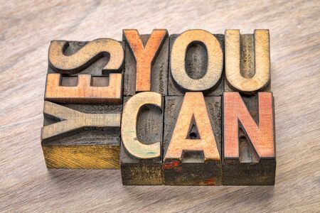 yes, you can - motivational word abstract in vintage letterpress wood type blocksの写真素材