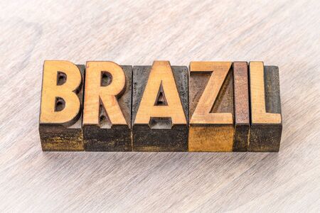 Brazil word in vintage letterpress wood type against grained woodの写真素材