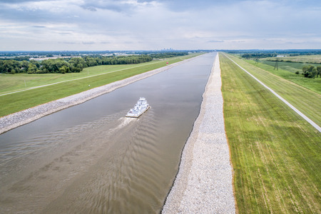 a tugboat on the Chain of Rocks Canal of MIssissippi River above St Louis - aerial viewの写真素材