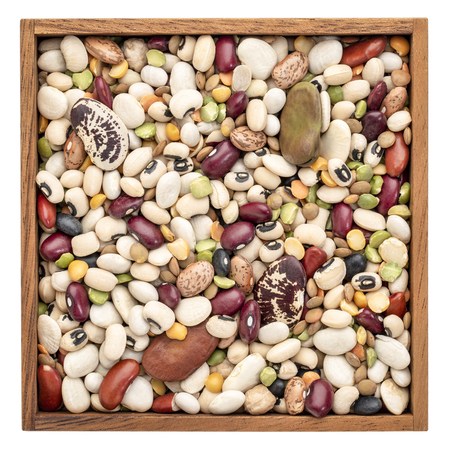 bean, lentils and pea soup mix in an isolated wooden box