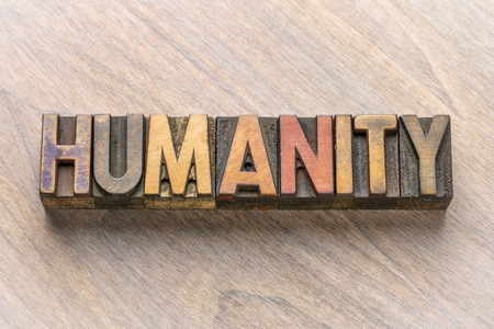 humanity  word in vintage letterpress wood type printing blocksの写真素材