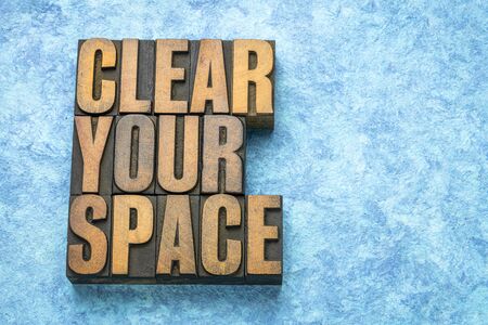 clear your space  - word abstract in vintage letterpress wood type printing blocksの写真素材