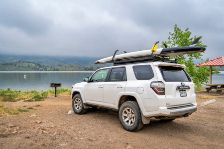 Fort Collins, CO, USA - July 22, 2019: Toyota 4Runner SUV with a performance stand up paddleboard on...
