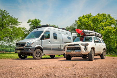 Pickstown, SD, USA - July 12, 2019: Two concepts for adventure travel - Toyota 4 Runner SUV and...