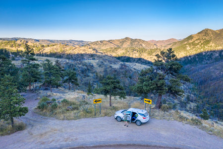 Pingree Park, CO, USA - August 27, 2019: Chevrolet Equinox compact SUV car parked on a dirt road in Rocky Mountains, aerial view.のeditorial素材