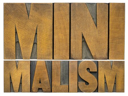 minimalism  - isolated word abstract in vintage letterpress wood type printing blocks, simplicity, mindset and lifestyle conceptの写真素材
