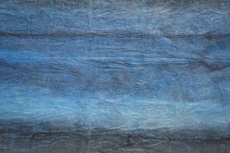 background of blue and gray rangichangi lokta paper handmade in Nepalの写真素材