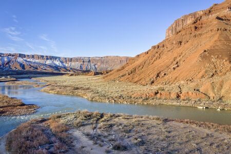 Aerial view of Colorado River at Rocky Rapid above Moab, Utah in winter scenery
