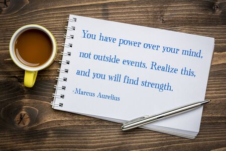 You have power over your mind, not outside events ... - ancient Roman Emperor and stoic philosopher Marcus Aurelius inspirational quote - handwriting in an  art sketchbook against grained wood with a cup of coffee, personal development and self improvement concept.の写真素材
