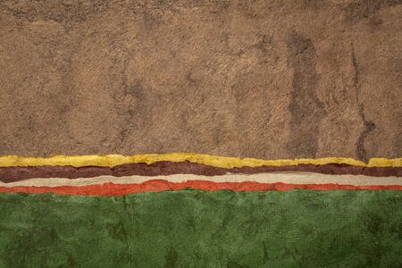 colorful landscape abstract created with sheets of handmade textured paperの写真素材
