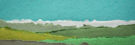 colorful abstract landscape - a collection of colorful handmade Indian papers produced from recycled cotton fabric, long web bannerの写真素材