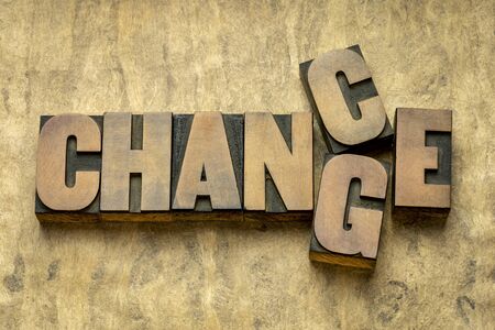 change and chance - word abstract in vintage letterpress wood type, opportunity in changing world conceptの写真素材