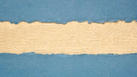colorful paper abstract with a copy space - sheets of bark and cotton rag paper