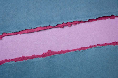 paper abstract in blue, pink and purple with a copy space - sheets of handmade cotton rag paper,...