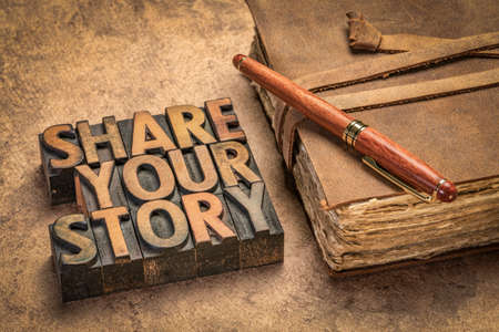 share your story word abstract in letterpress wood type with an antique journal, business, education, communication conceptの写真素材