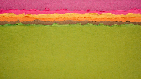 abstract landscape in green and pink pastel tones - a collection of colorful handmade Indian papers produced from recycled cotton fabricの写真素材