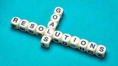 goals and resolutions crossword in dice letters, New Year planning concept