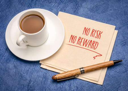 no risk, no rewards - inspirational handwriting or reminder on a napkin with a cup of coffee, business, finance and personal development conceptの写真素材