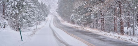 winter travel in Colorado Rocky Mountains - highway in Poudre Canyon in a heavy early spring...