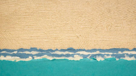 lake or ocean abstract landscape in blue and beige pastel tones - a collection of handmade bark and rag papersの写真素材