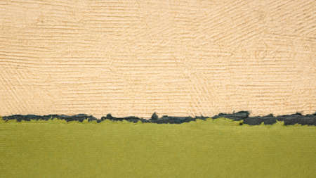 abstract paper landscape in green and beige pastel tones created from sheets of handmade textured...