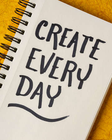 create every day - inspirational reminder or advice, handwriting in a sketchbook, creativity and personal development conceptの写真素材