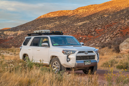 Fort Collins, CO, USA - October 20, 2021: Toyota 4Runner SUV (2016 Trail Edition) at sunset in Red...
