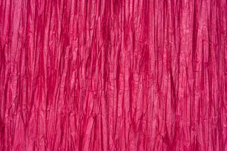 background and texture of Thai pleated Unryu mulberry paper, lightweight, soft, translucent and vibrant - burgundyの写真素材