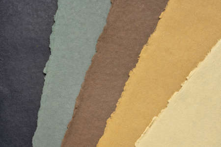 collection of handmade Indian rag paper in earth tones produced from recycled cotton fabricの写真素材