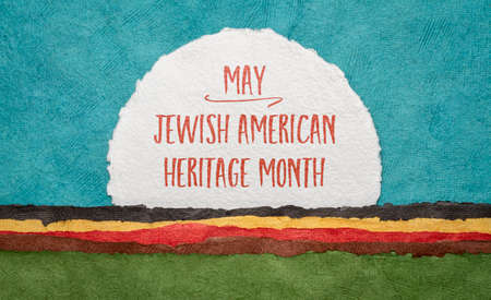 May American Jewish Heritage Month - handwriting on a round sheet of watercolor paper against abstract landscape, reminder of cultural eventの写真素材