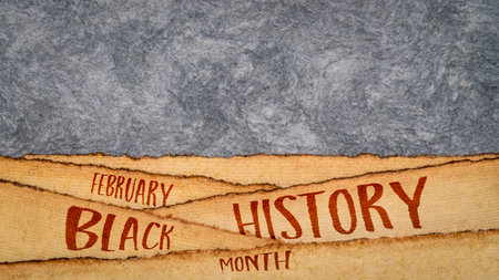 February - Black History Month, e handwriting against abstract paper landscape, annual observance...